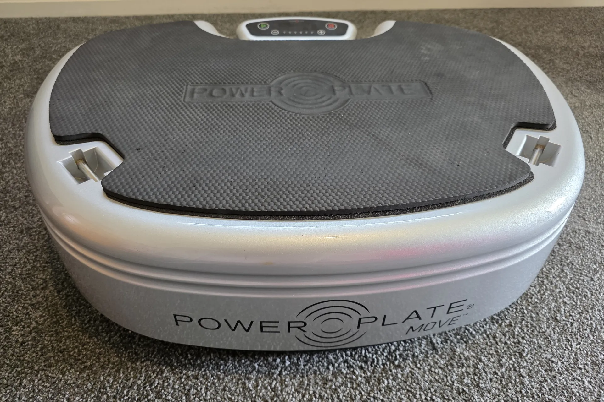 Silver Power Plate Move vibration plate on carpet