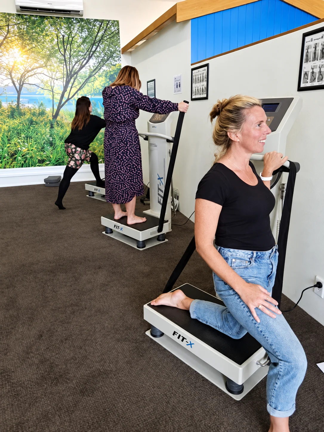 Women using Body Buzz vibration-training platforms