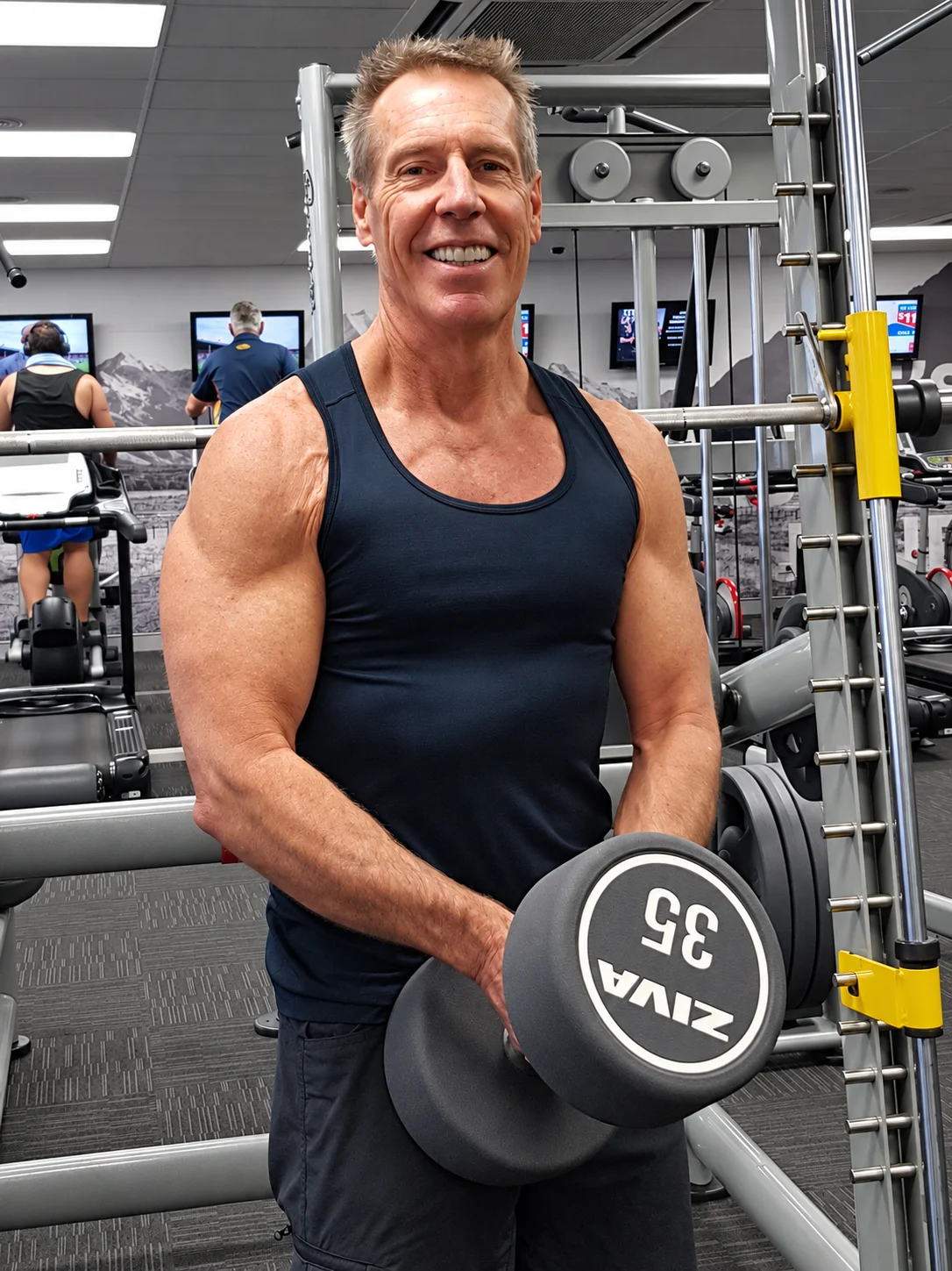 Marty holding a dumbbell in a gym